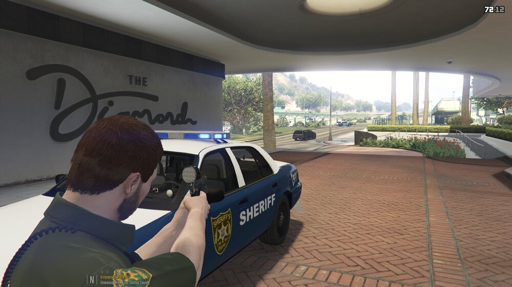 Could contain: vehicle, land vehicle, wheel, person, tire, clothing, outdoor, ground, car, van