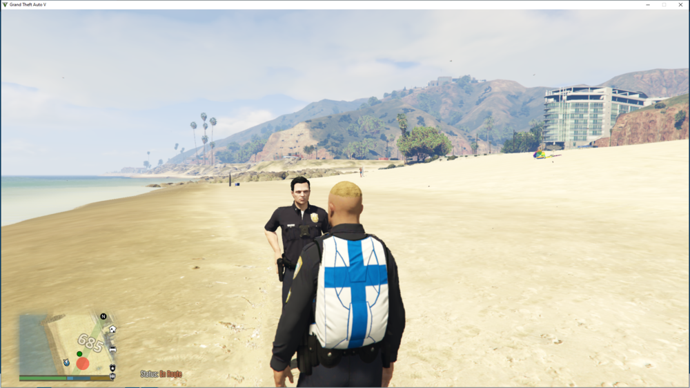 Could contain: outdoor, clothing, sky, person, cloud, shore, beach, travel, tourism, nature, ground, mountain