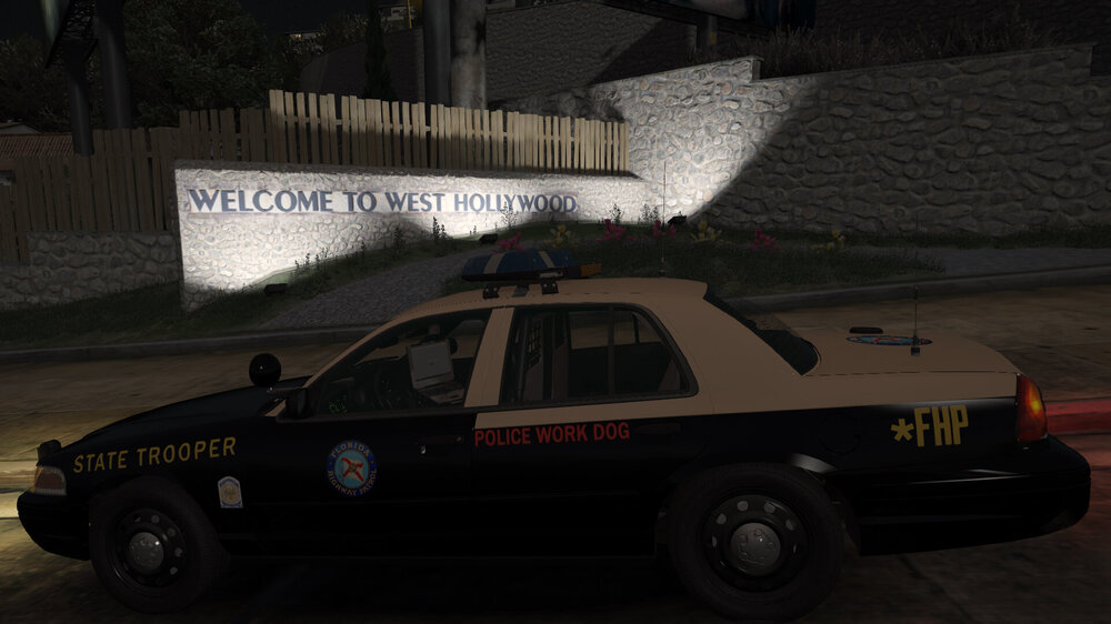 Could contain: vehicle, land vehicle, wheel, transport, text, car, tire, police, law enforcement, outdoor, police car, ford crown victoria police interceptor, street