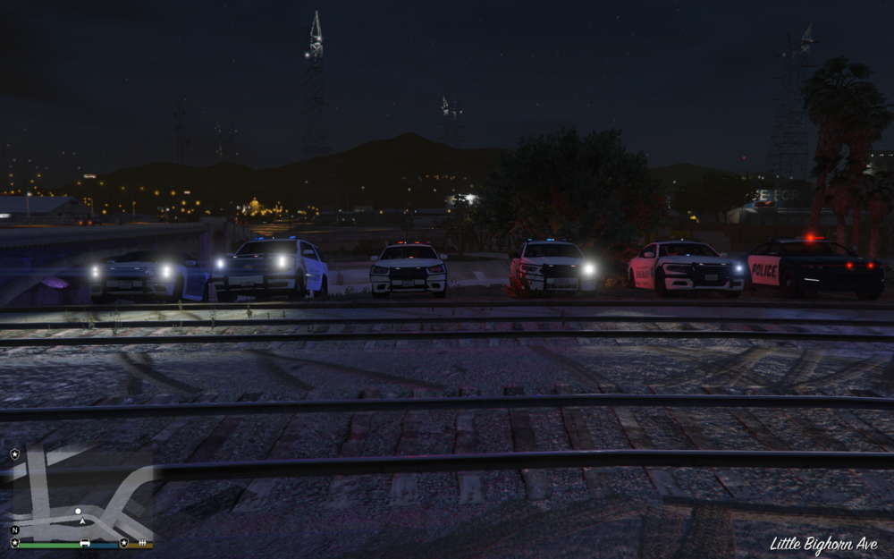 Could contain: outdoor, sky, night, vehicle, electricity, track, train, land vehicle, street light, light, ground, railroad