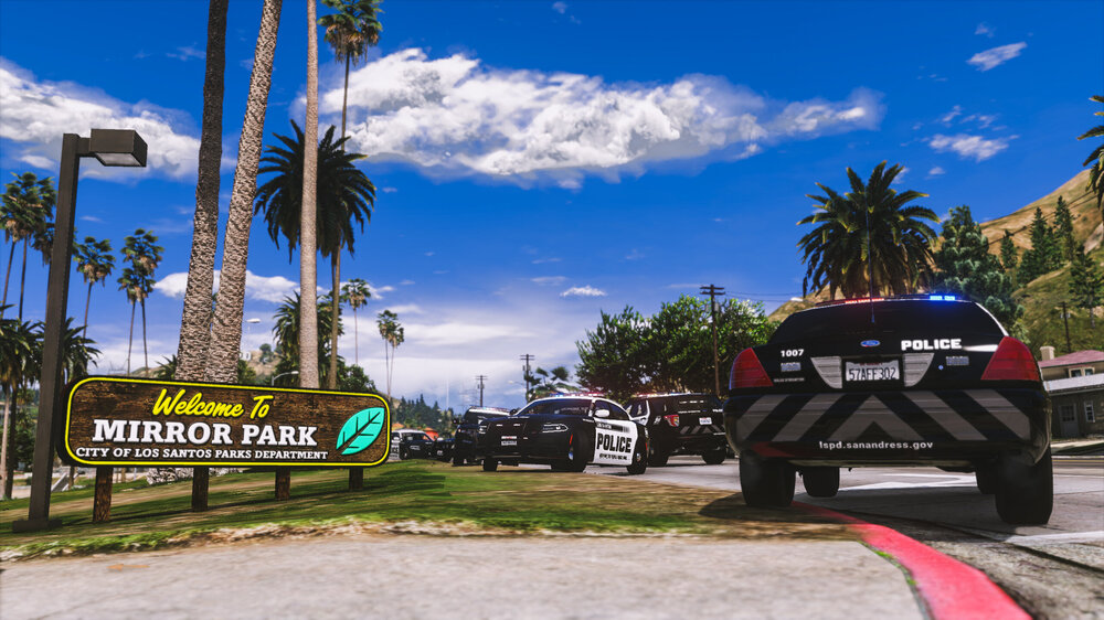 Could contain: outdoor, sky, cloud, palm tree, land vehicle, wheel, vehicle, tree, arecales, tire, text, road, car, sign, ground, street, palm, parked