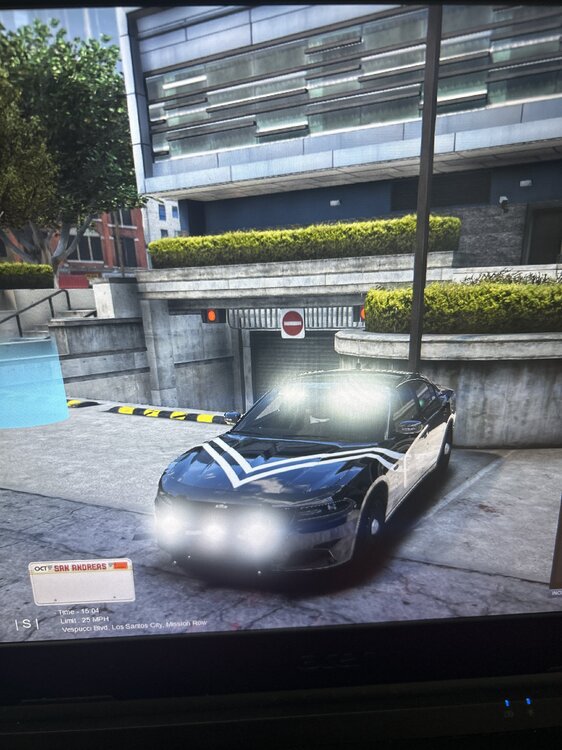 Could contain: vehicle, land vehicle, building, outdoor, wheel, ground, car