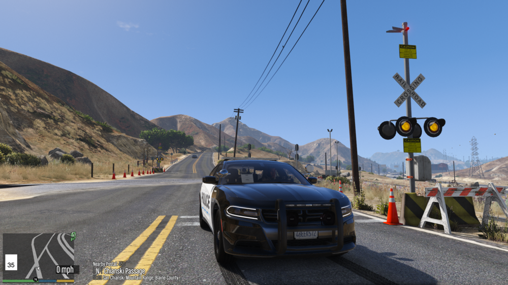 Could contain: outdoor, sky, vehicle, land vehicle, wheel, road, luxury vehicle, tire, text, mid-size car, automotive design, sports sedan, executive car, vehicle registration plate, sedan, family car, personal luxury car, mountain, street, car