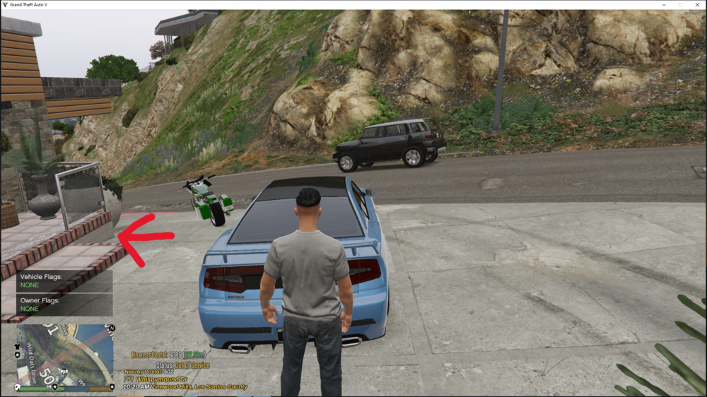 Could contain: outdoor, vehicle, car, land vehicle, wheel, clothing, man, road, person, ground, mountain