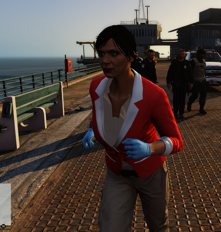 Could contain: clothing, person, outdoor, sky, ground, human face, travel, woman, sidewalk, red