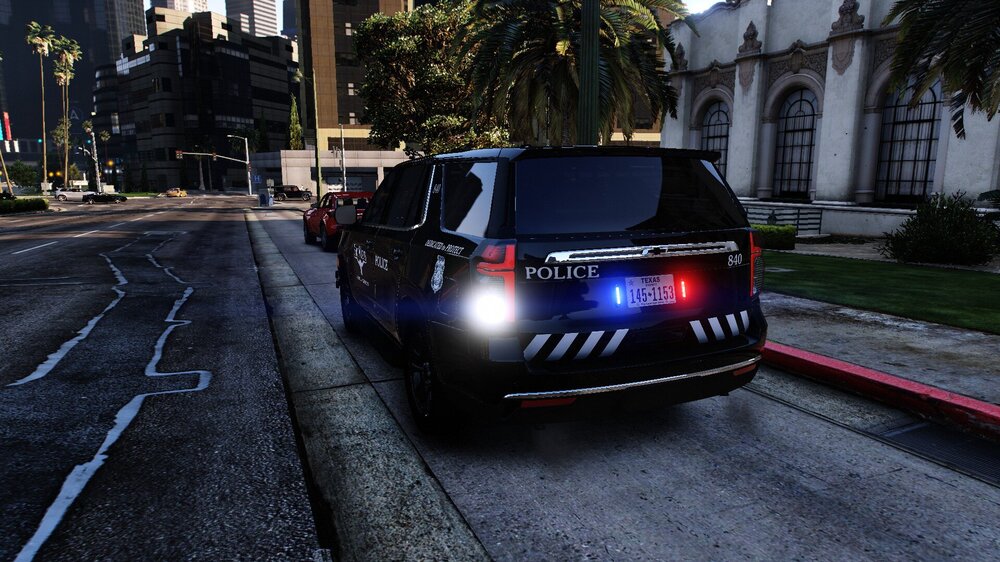 Could contain: land vehicle, vehicle, outdoor, text, road, wheel, vehicle registration plate, tire, auto part, automotive exterior, automotive lighting, street, automotive design, bumper, motor vehicle, automotive tail & brake light, ground, police, city, driving, light, car