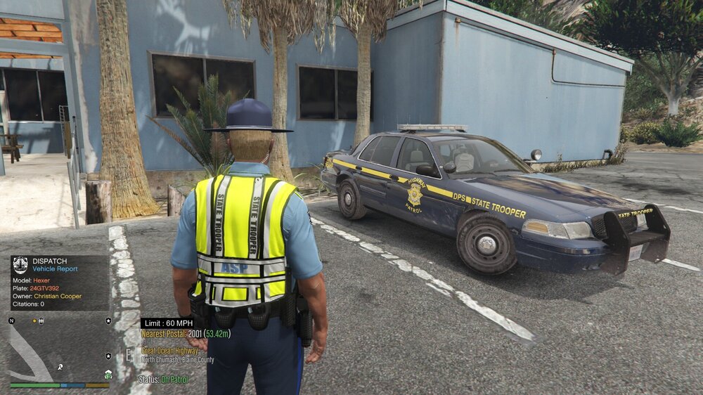 Could contain: outdoor, land vehicle, vehicle, car, wheel, clothing, text, person, high-visibility clothing, building, emergency service, vehicle registration plate, road, tire, police, officer, street, wearing