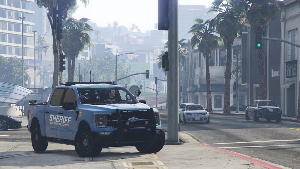 Could contain: vehicle, outdoor, land vehicle, wheel, tire, sky, road, auto part, sport utility vehicle, building, transport, street, automotive exterior, car, driving, city, travel