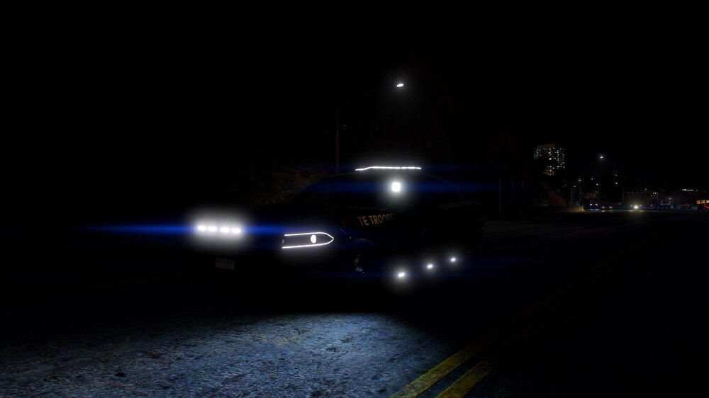 Could contain: vehicle, outdoor, night, land vehicle, road, car, darkness, ground, street, light, dark