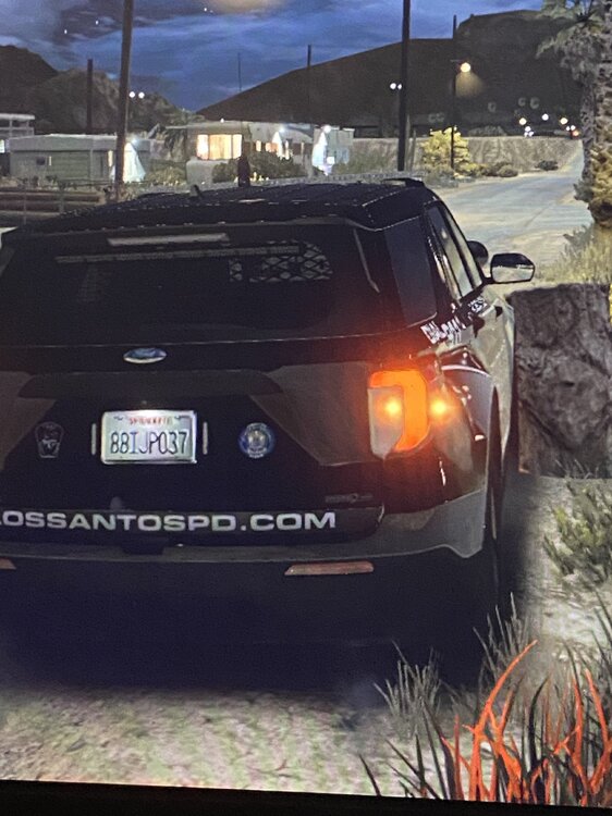 Could contain: vehicle, land vehicle, outdoor, text, tire, wheel, automotive lighting, auto part, vehicle registration plate, automotive exterior, bumper, automotive design, automotive tail & brake light, transport, sky, automotive parking light, automotive side marker light, car, ground, mountain