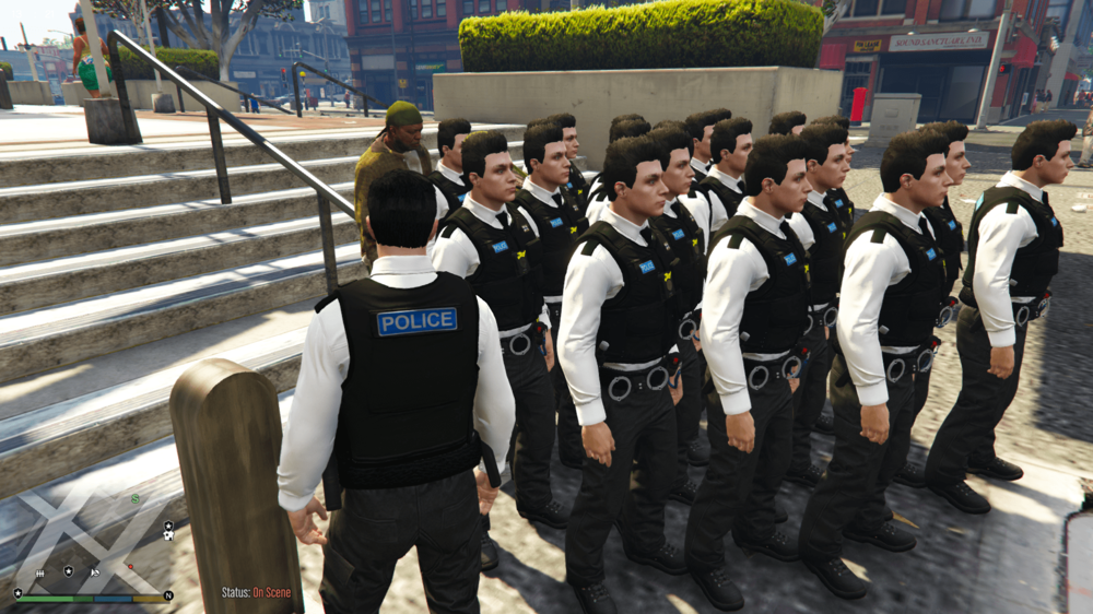 Could contain: clothing, person, outdoor, footwear, man, crew, group, team, people, police, uniform, officer, standing, ground