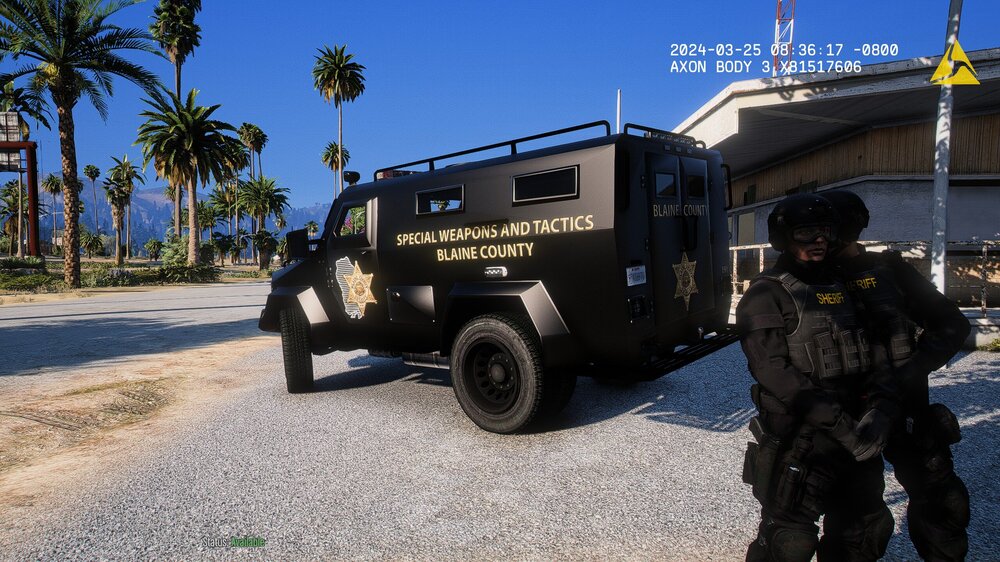 Could contain: outdoor, sky, vehicle, wheel, land vehicle, tire, transport, tree, clothing, person, auto part, palm tree, law enforcement, ground, military, military vehicle