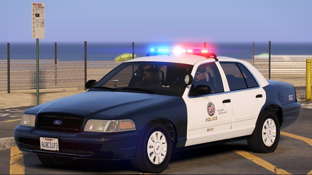 Could contain: vehicle, land vehicle, wheel, outdoor, sky, tire, transport, vehicle registration plate, bumper, car, road, auto part, full-size car, sedan, light, police