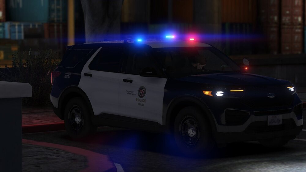 Could contain: vehicle, land vehicle, wheel, tire, transport, police, sport utility vehicle, auto part, bumper, outdoor, building, compact sport utility vehicle, automotive lighting, automotive exterior, road, car, night, light, street