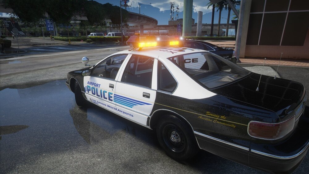 Could contain: vehicle, land vehicle, transport, wheel, outdoor, text, police car, full-size car, police, law enforcement, sedan, ford crown victoria police interceptor, car, vehicle registration plate, emergency service, emergency vehicle, street