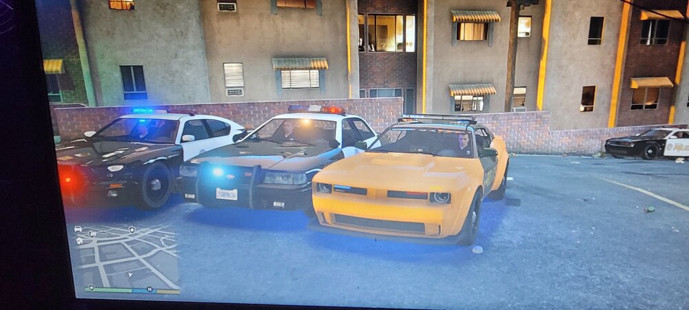 Could contain: vehicle, land vehicle, building, wheel, car, auto part, automotive exterior, tire, outdoor, parked, yellow, indoor