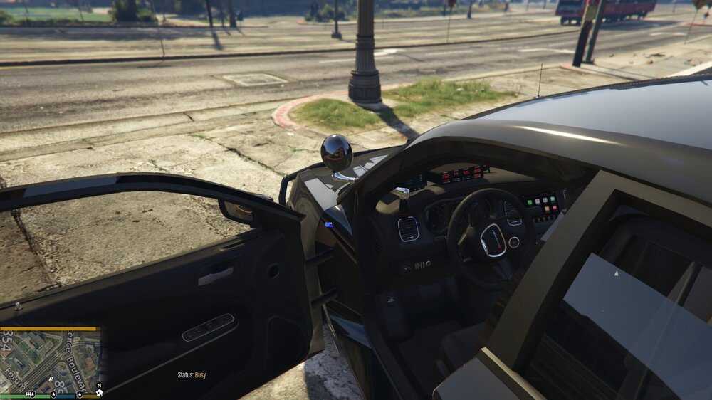 Could contain: vehicle, outdoor, land vehicle, wheel, auto part, motor vehicle, windshield, steering wheel, transport, center console, mirror, ground, car