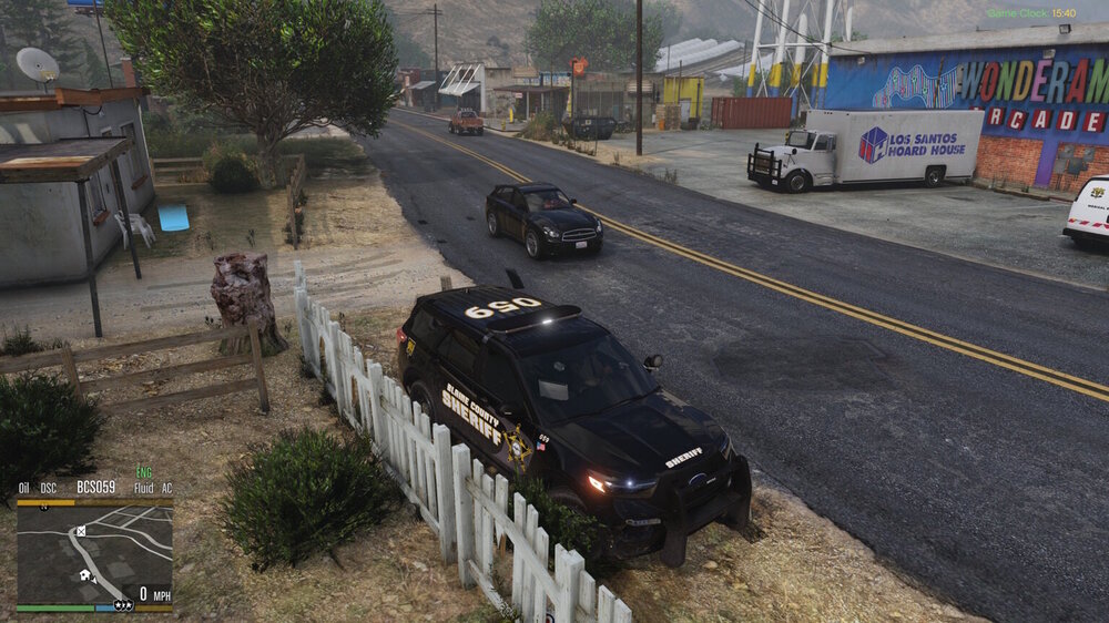 Could contain: outdoor, land vehicle, vehicle, wheel, road, car, tree, thoroughfare, traffic, transport, bus, text, street, mode of transport, way, grass, ground