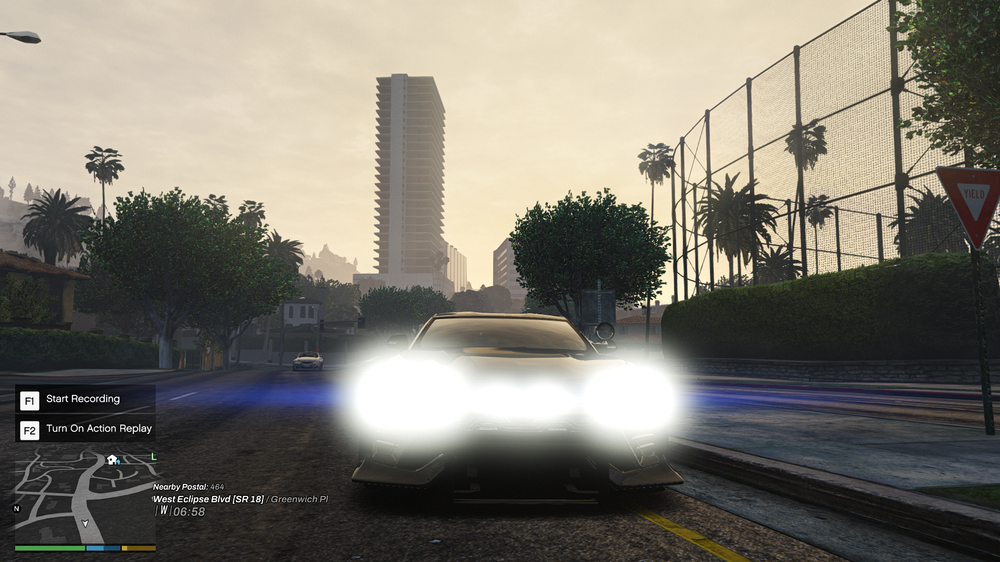 Could contain: outdoor, tree, land vehicle, sky, vehicle, car, screenshot, skyscraper, street light, city