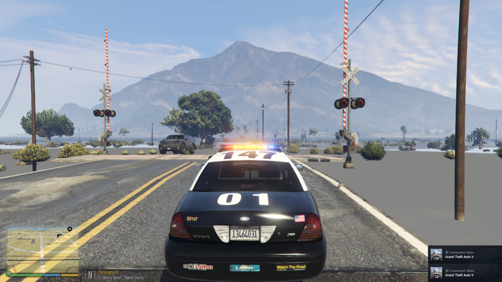 Could contain: outdoor, text, sky, vehicle, land vehicle, road, wheel, vehicle registration plate, car, mountain, way, lane, asphalt, freeway, thoroughfare, street, traffic, cloud, highway, light