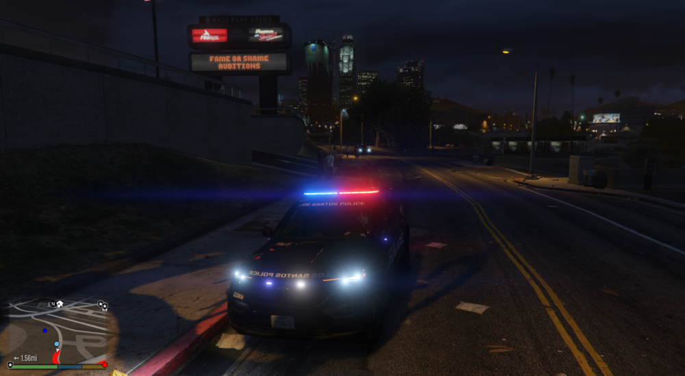 Could contain: outdoor, vehicle, sky, land vehicle, road, electricity, street light, screenshot, way, car, street, night, light, track