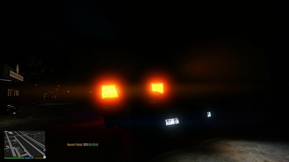 Could contain: outdoor, darkness, night, sky, street, road, electricity, traffic, traffic light, light, dark, signal, ground