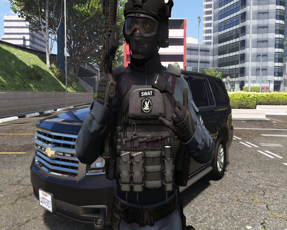 Could contain: outdoor, vehicle, land vehicle, road, person, clothing