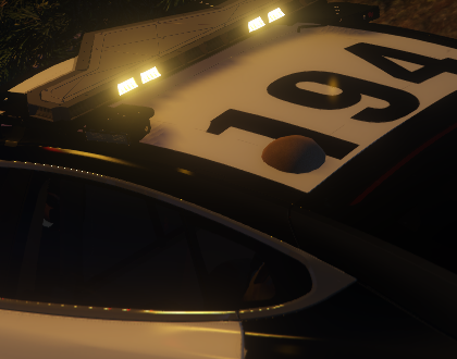 Could contain: outdoor, car, sign, night, light