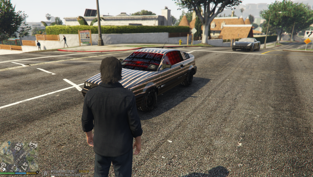 Could contain: outdoor, vehicle, land vehicle, wheel, tire, sky, road, car, ground, clothing, person, man, street