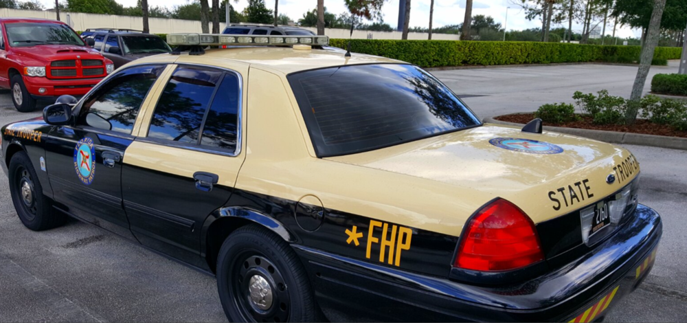 Could contain: vehicle, land vehicle, wheel, transport, outdoor, text, vehicle registration plate, tire, sedan, police, full-size car, ford crown victoria police interceptor, automotive exterior, auto part, bumper, automotive parking light, automotive side marker light, automotive tail & brake light, law enforcement, car, hardtop, mid-size car, trunk, motor vehicle, parked