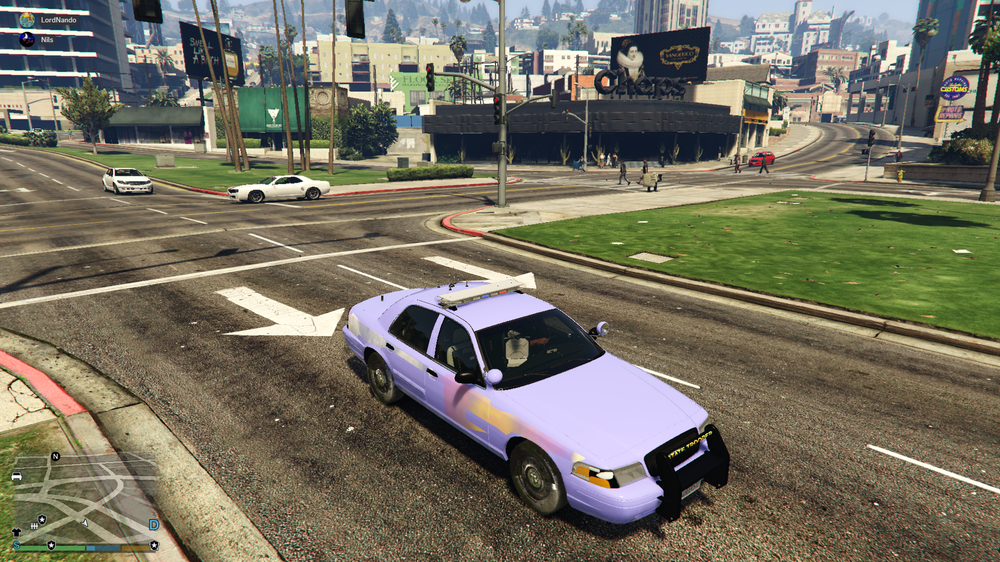 Could contain: vehicle, land vehicle, outdoor, wheel, road, grass, transport, car, ground, city, street, blue