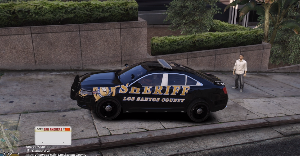 Could contain: vehicle, land vehicle, wheel, outdoor, text, transport, road, tire, car, police, ground, street, parked