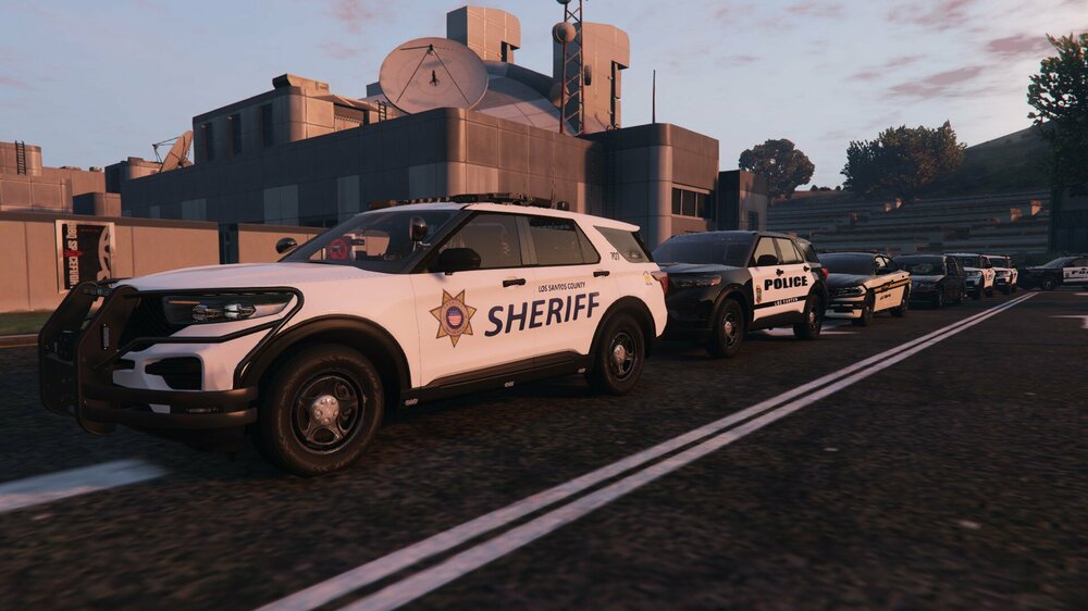 Could contain: vehicle, land vehicle, wheel, sky, outdoor, tire, car, road, building, transport, automotive design, auto part, motorsport, ground, street, parked