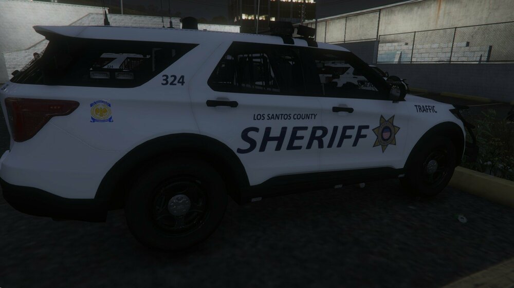 Could contain: vehicle, land vehicle, wheel, tire, transport, text, auto part, sport utility vehicle, motor vehicle, automotive exterior, car, bumper, compact sport utility vehicle, roof rack, automotive tire, police, ford, crossover suv, automotive luggage rack, police car, parked, outdoor