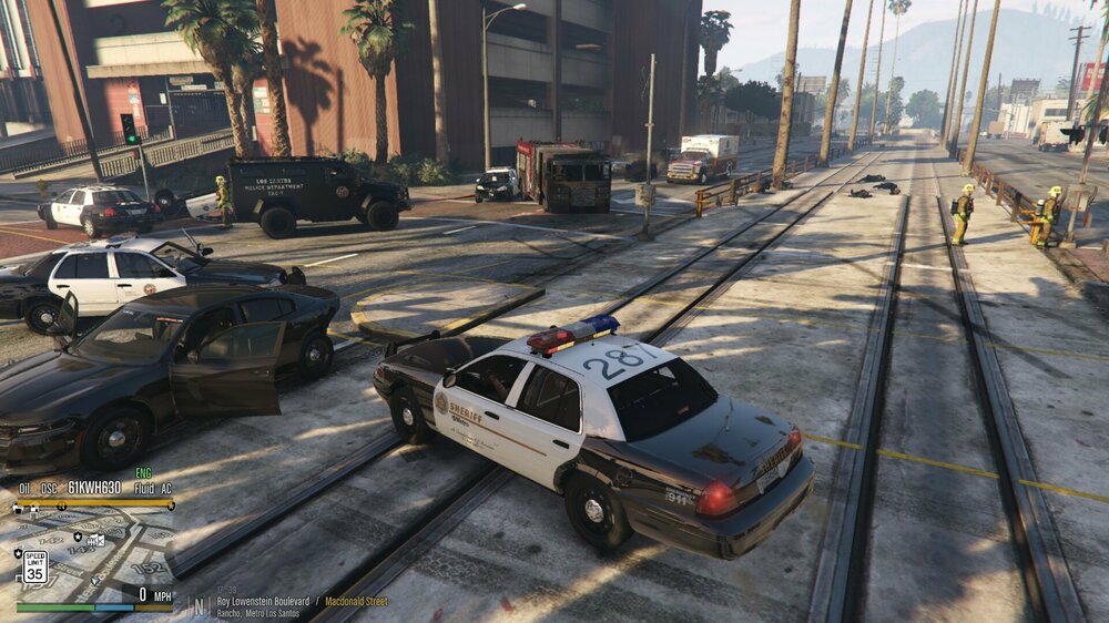 Could contain: vehicle, land vehicle, outdoor, wheel, building, tire, car, road, ground, street, way, city, track