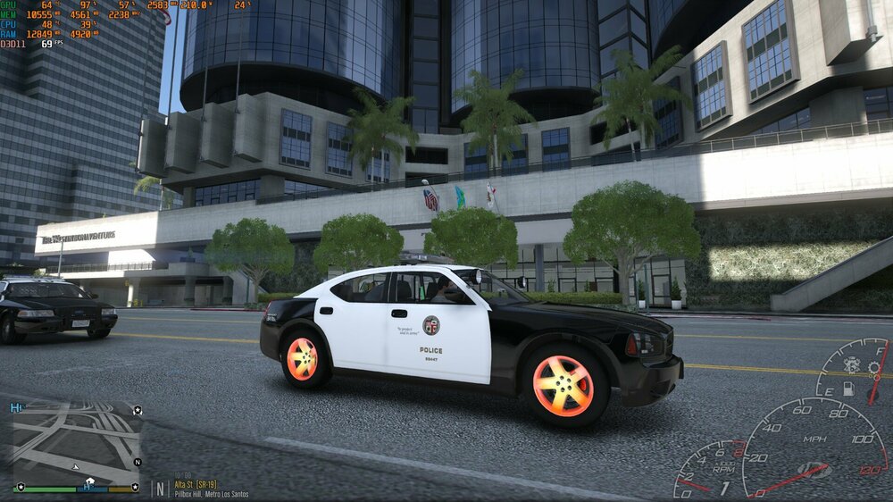 Could contain: vehicle, land vehicle, wheel, tire, transport, building, outdoor, auto part, road, car
