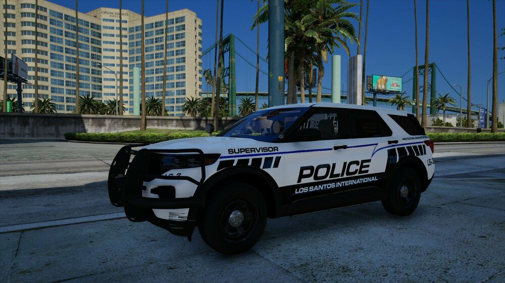 Could contain: vehicle, outdoor, land vehicle, wheel, transport, sky, tire, police, building, car, road, police car, street