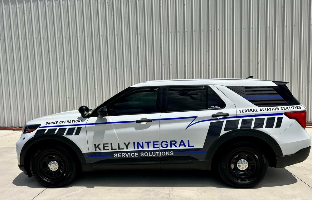 Could contain: vehicle, wheel, land vehicle, tire, transport, car, police car, law enforcement, text, auto part, sport utility vehicle, bumper, automotive exterior, ford, outdoor, emergency service, emergency vehicle, compact sport utility vehicle, roof rack, automotive tire, full-size car, police