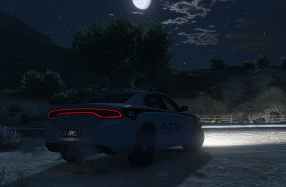 Could contain: vehicle, land vehicle, moon, wheel, outdoor, sky, tire, night, car, auto part, ground, mountain