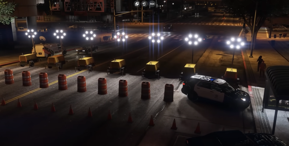 Could contain: vehicle, land vehicle, outdoor, night, wheel, car, building, street, city, light