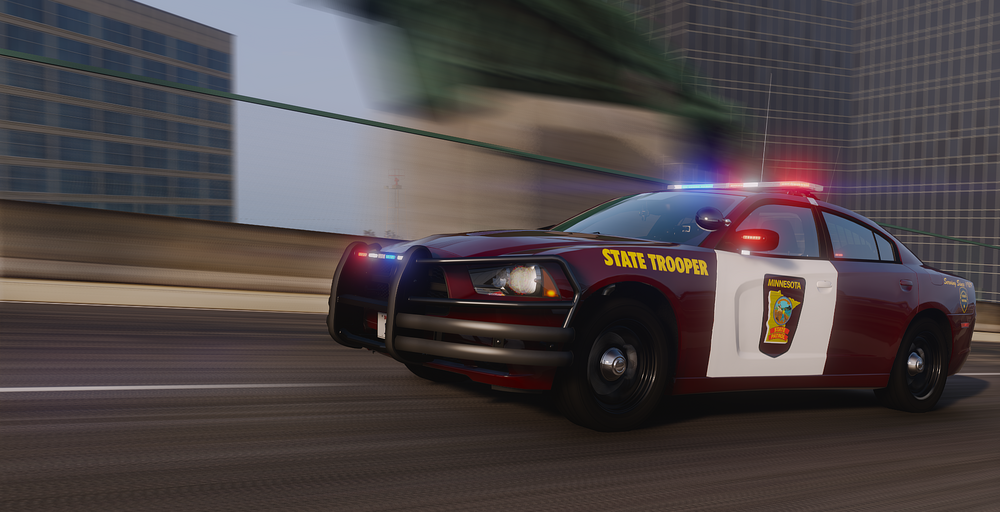 Could contain: vehicle, land vehicle, wheel, transport, tire, road, motorsport, outdoor, bumper, race car, red, car, street