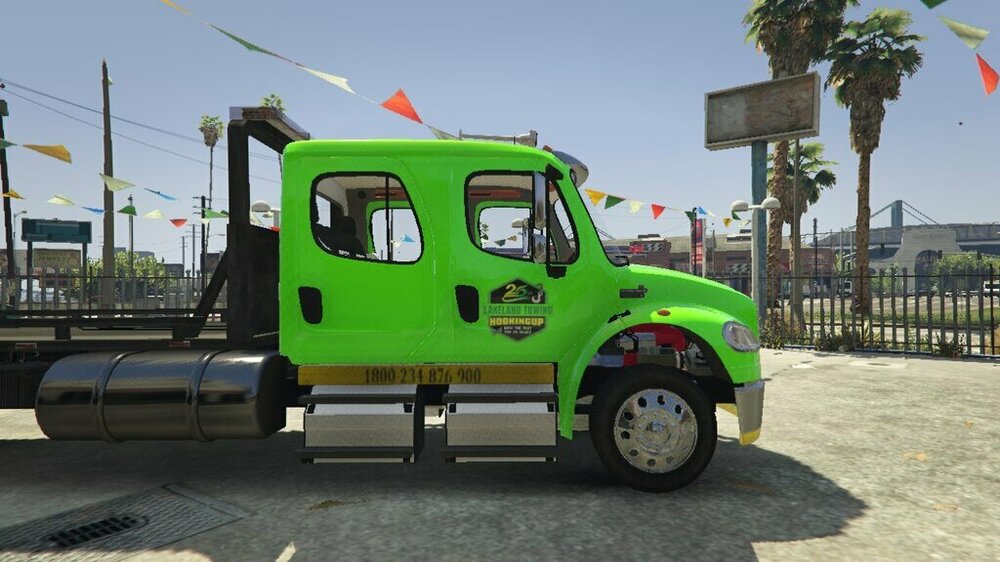 Could contain: sky, vehicle, outdoor, wheel, land vehicle, transport, tire, tree, truck, auto part, green, motor vehicle, road, mode of transport, ground, parked, large