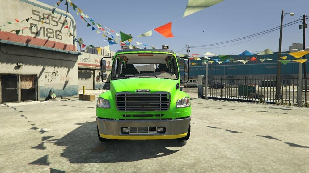 Could contain: vehicle, sky, outdoor, land vehicle, transport, wheel, road, ground, yellow, green, parked, parking, truck