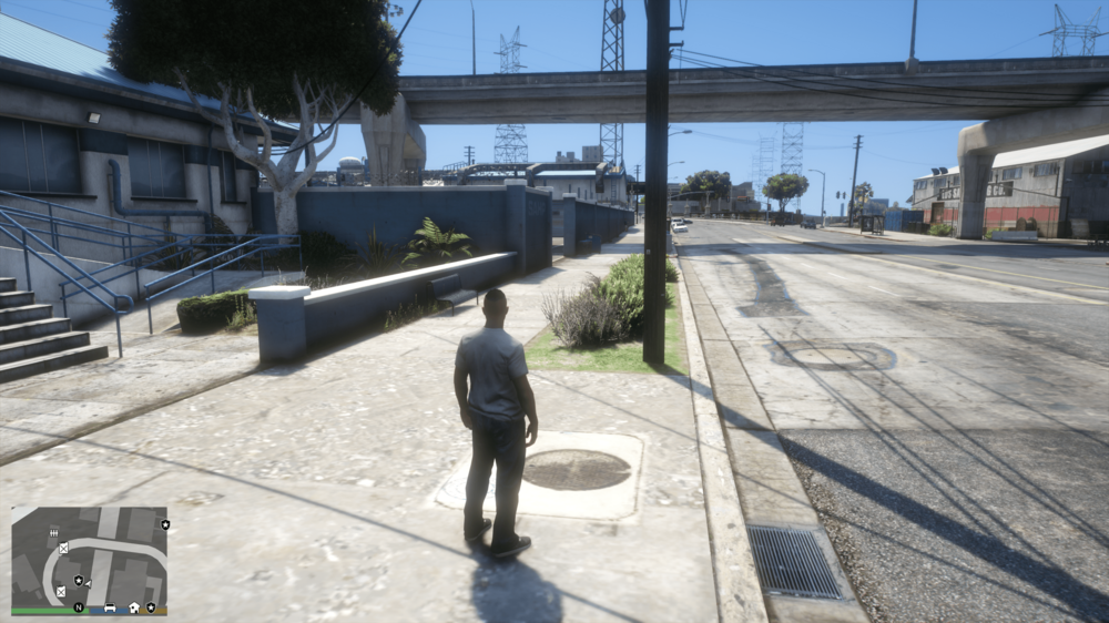 Could contain: outdoor, sky, tree, ground, person, clothing, track, road, way, sidewalk, bridge