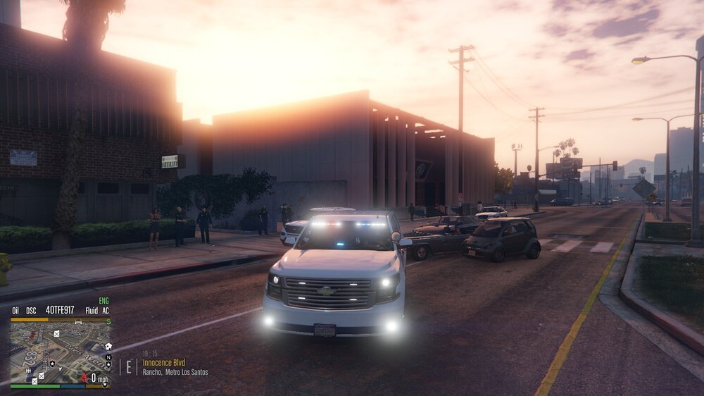 Could contain: land vehicle, vehicle, sky, outdoor, wheel, cloud, road, text, screenshot, tire, street, light, car, city