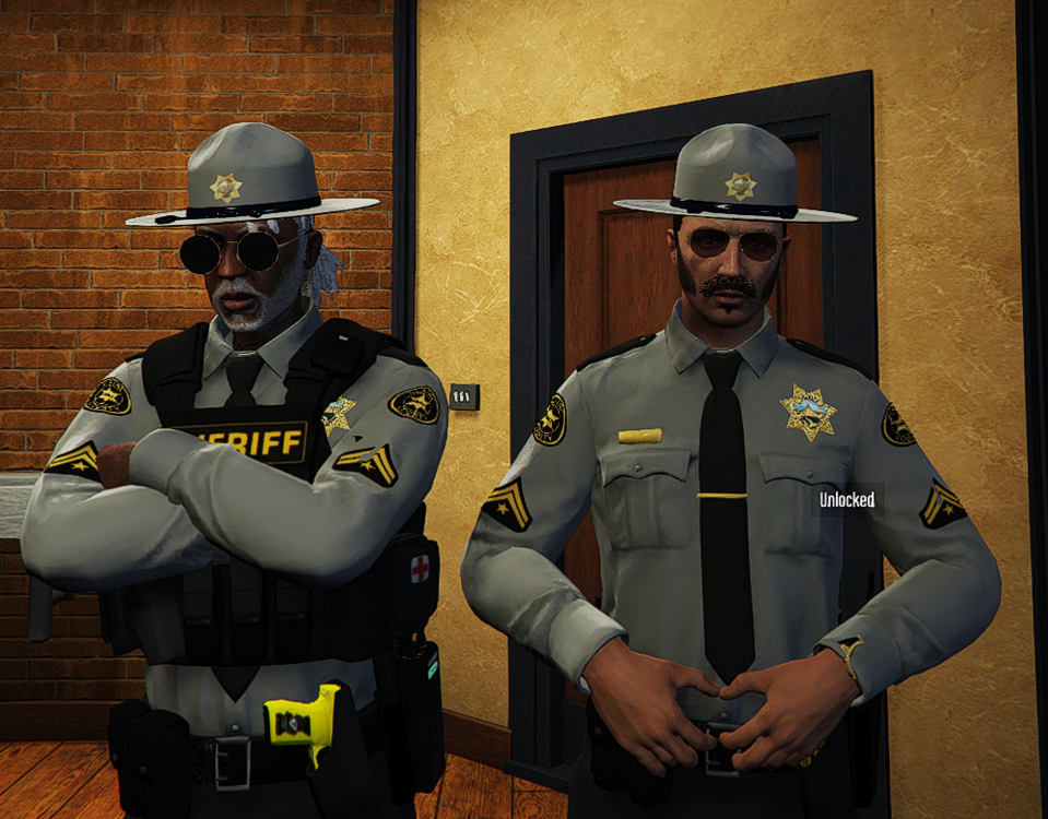 Could contain: person, clothing, security, police officer, helmet, personal protective equipment, official, law enforcement, man, uniform, government agency, human face, wall, military uniform, officer, police, indoor, wearing