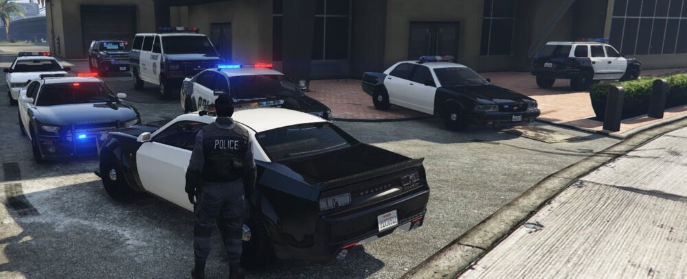 Could contain: vehicle, wheel, land vehicle, tire, outdoor, auto part, road, car, building, automotive exterior, ground, motor vehicle, police, street, parked