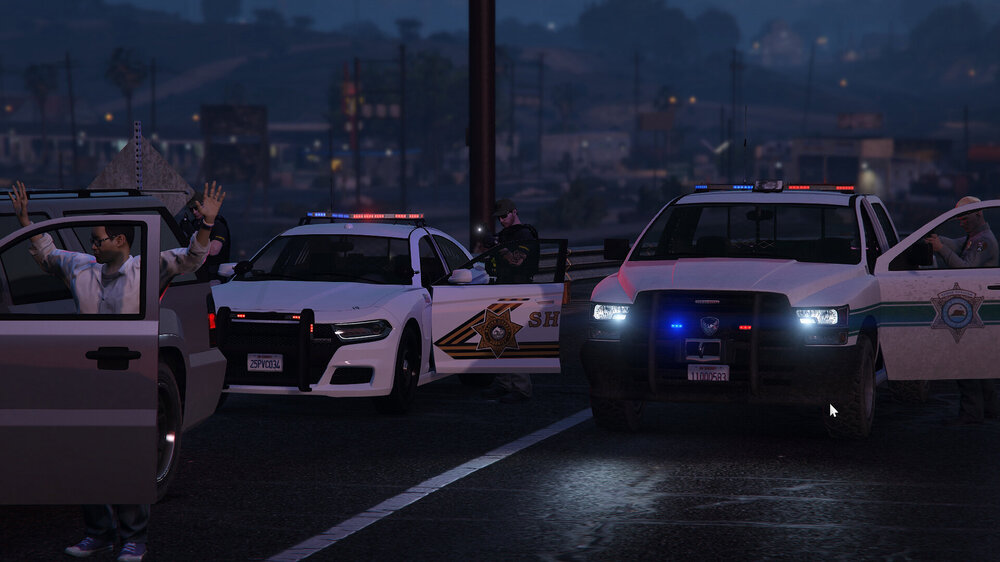 Could contain: vehicle, land vehicle, wheel, outdoor, tire, road, car, automotive exterior, transport, auto part, police car, police, automotive lighting, street