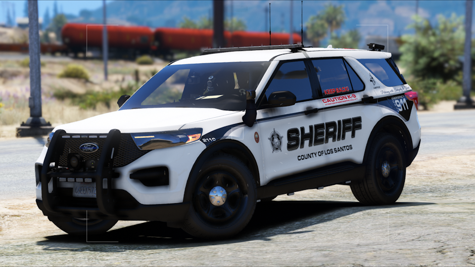 Could contain: vehicle, land vehicle, wheel, tire, outdoor, transport, car, police car, auto part, law enforcement, bumper, ford, sport utility vehicle, automotive tire, automotive exterior, roof rack, police