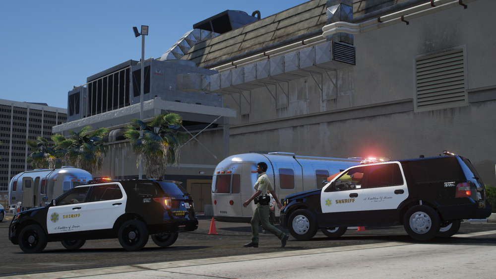 Could contain: vehicle, outdoor, wheel, transport, land vehicle, tire, building, road, sky, motor vehicle, auto part, mode of transport, light commercial vehicle, truck, parked, street, city, police